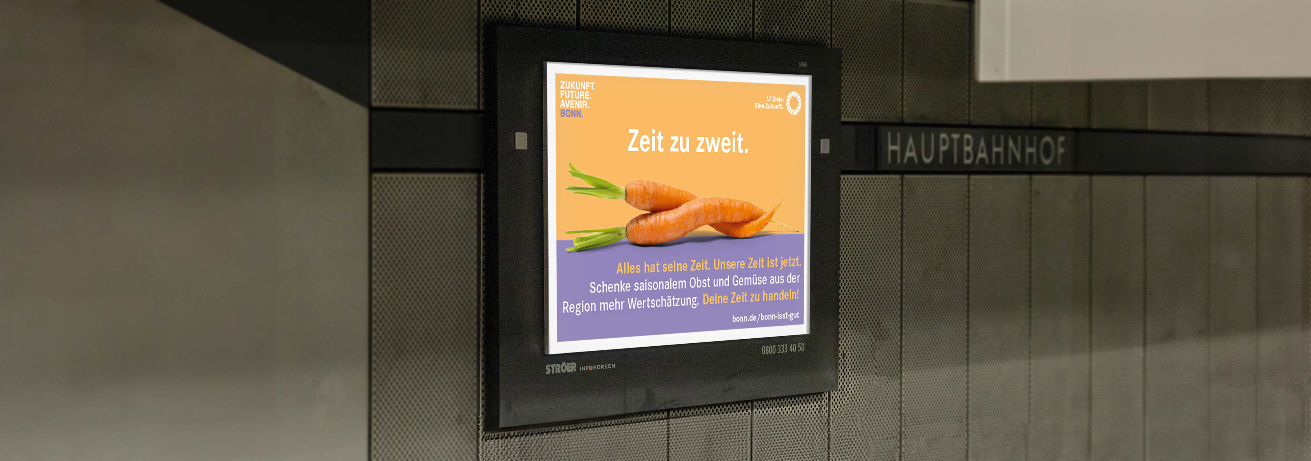 Infoscreen mit Kampagnenmotiv in U-Bahn-Station