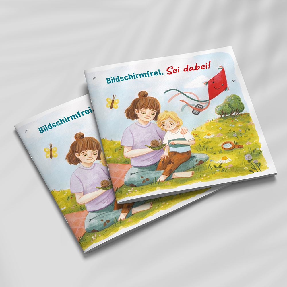 Zwei Bilderbücher liegen aufeinander